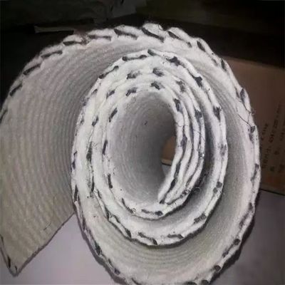 Réseau de drainage composite pour gazon artificiel