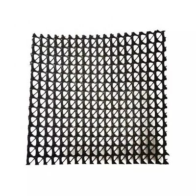 Réseau de drainage composite pour gazon artificiel